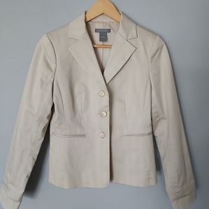 Ann Taylor Suit Cream colored. Blazer size 2, trousers size 4 signature fit.
